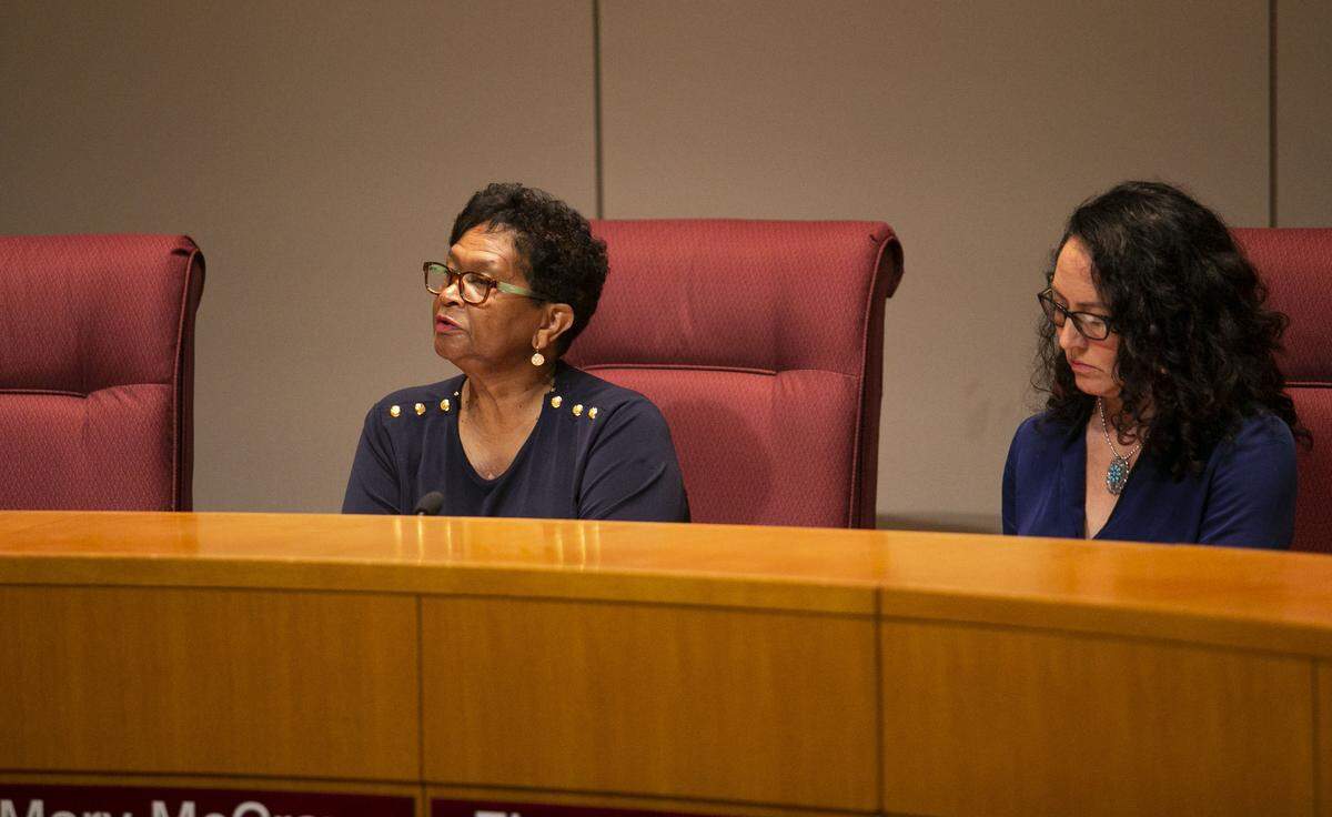 Chair Mary McCray gives a statement leading up to a closed session after CMS suspended Superintendent Clayton Wilcox last week at the Government Center in Charlotte on Friday, July 19, 2019.