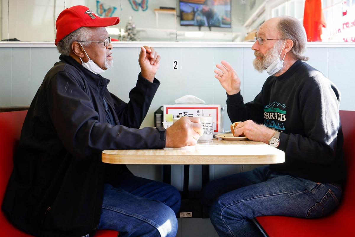 Walter, left, and Ron talk over lunch and coffee at Main Street Grille in Norwood.