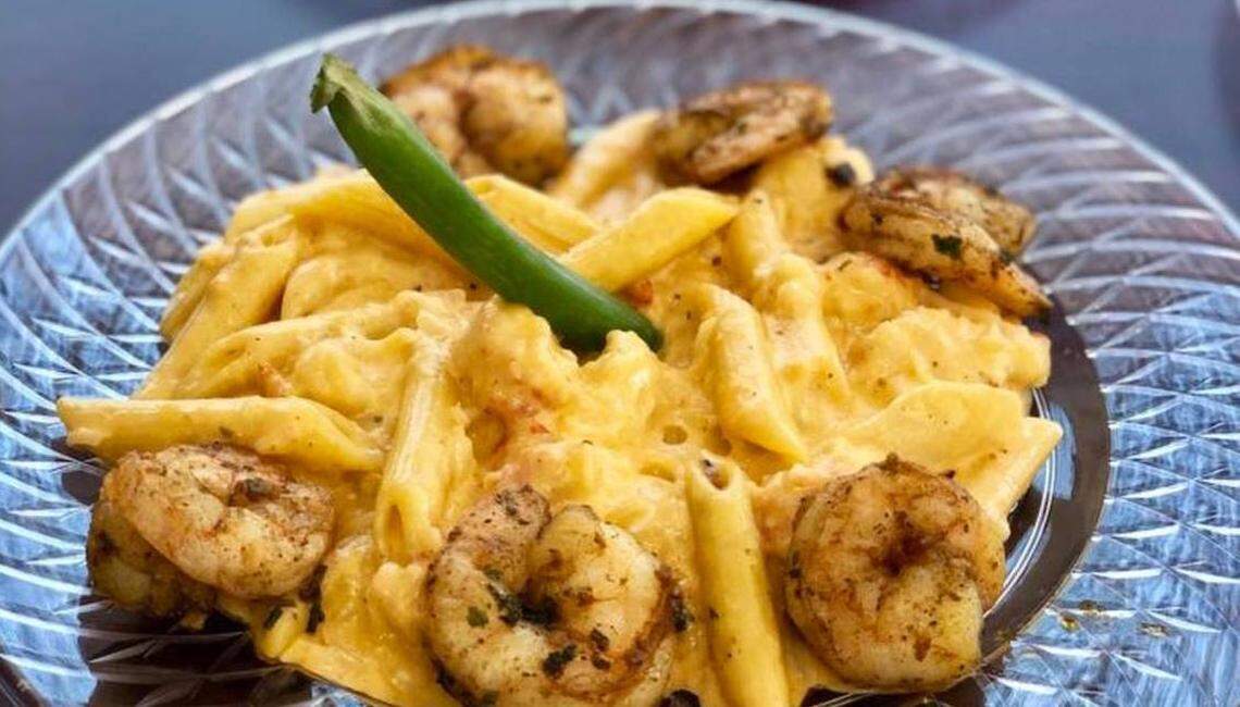 Cuzzo’s Cuisine Lobster Mac and Cheese is served with a side of shrimp.
