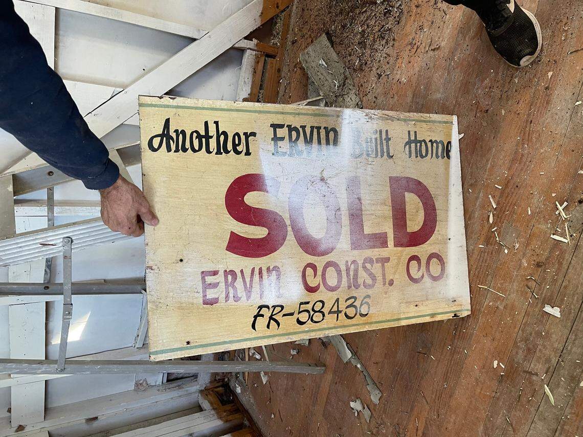 The “for sale” sign of a Plaza Midwood-area home built by the Ervin Construction Co. in 1957. Realtor Jonathan Osman recently found a number of used razor blades at the partially gutted home.