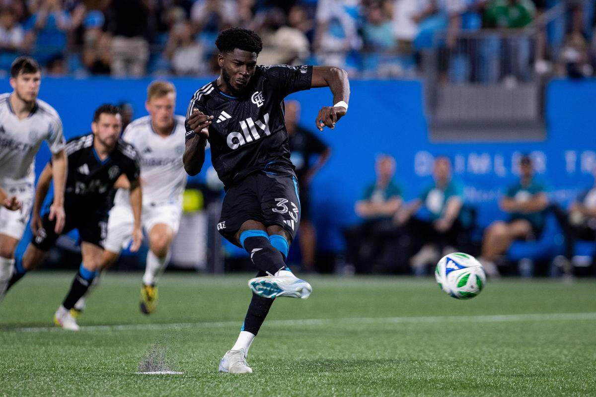 Charlotte FC forward Patrick Agyemang (33) shoots a penalty during the first half against the San Diego FC on Saturday night at Bank of America Stadium. Scott Kinser-Imagn Images