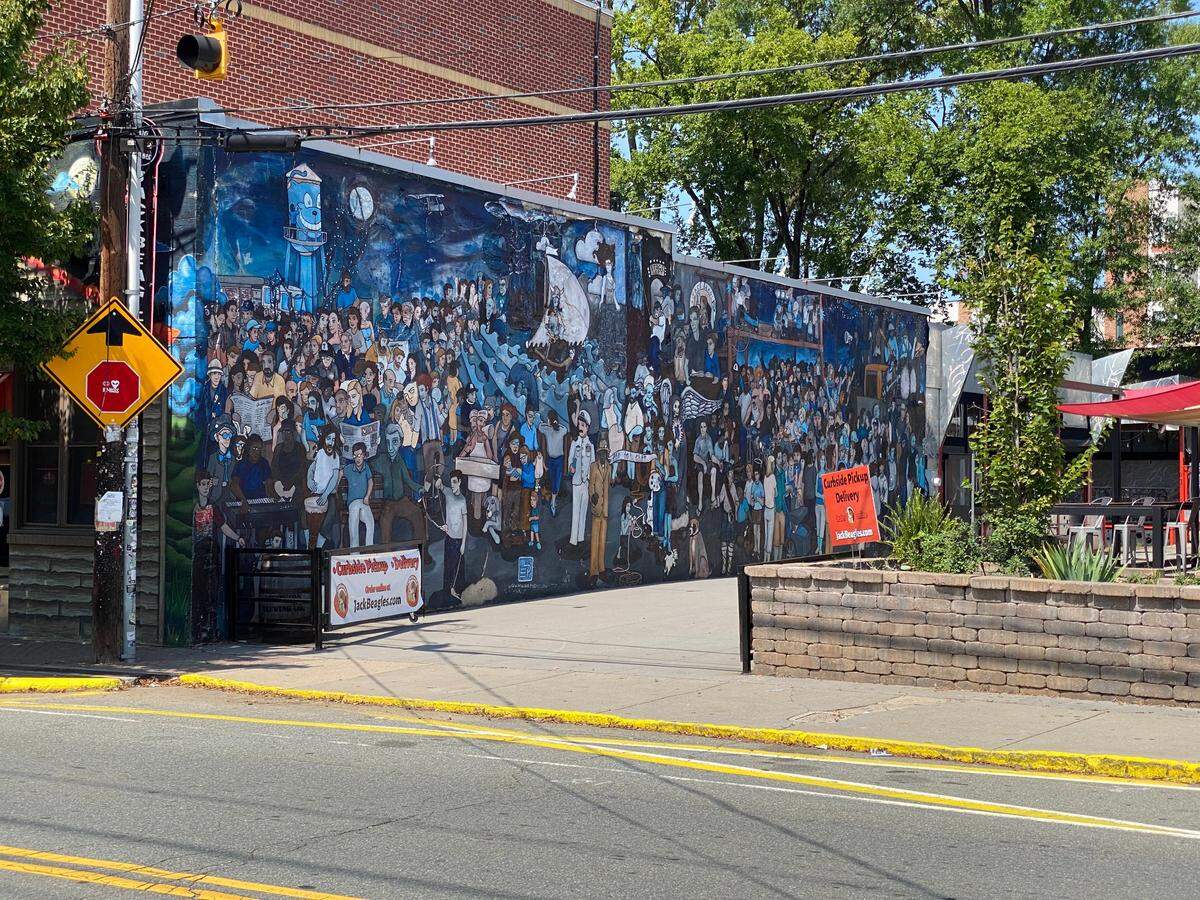 “Als Ich Khan: A Tribute to NoDa” at 3205 N. Davidson Street on the side of Jack Beagle’s by William Puckett, 2010