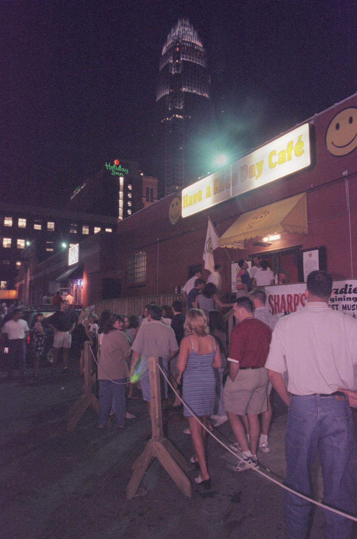 6/26/98 The NationsBank tower serves as a backdrop for a revitalized uptown entertainment and club scene Friday night. Once pronounced dead, the area has come back to life with bars, restaurants and clubs hopping every weekend.