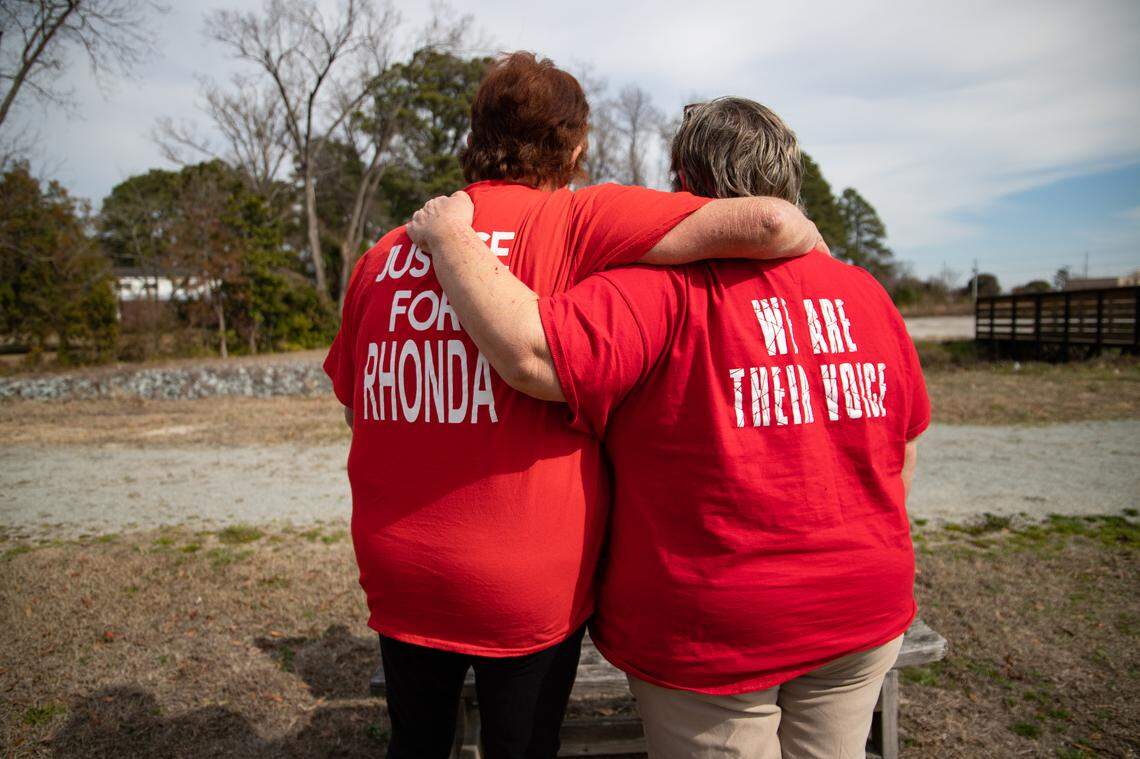 Shelia Price (left) and Angela Baxley (right) wear their Shatter The Silence shirts, reading Justice for Rhonda and We are their voices.