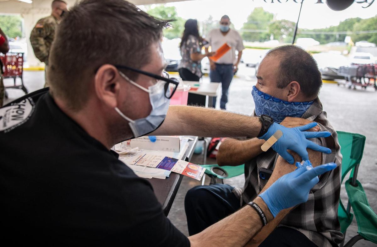 Health departments in the Charlotte region are setting lower vaccination targets than the president.