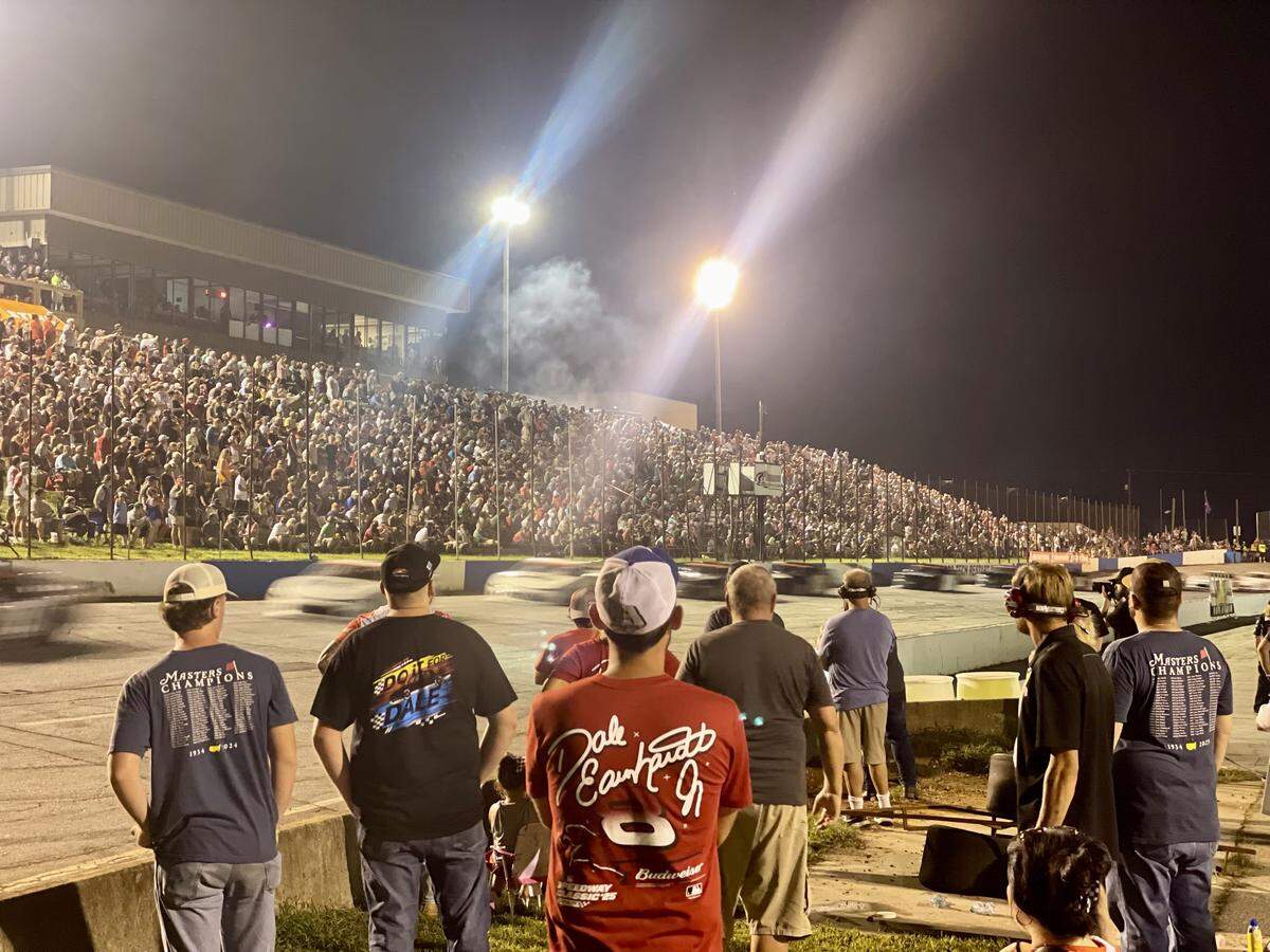 Fans watch the late model stock car race by the CARS Tour on Saturday, August 16, 2025, at Anderson Motor Speedway, where Dale Earnhardt Jr. showed off a special throwback paint scheme with the No. 8 car.