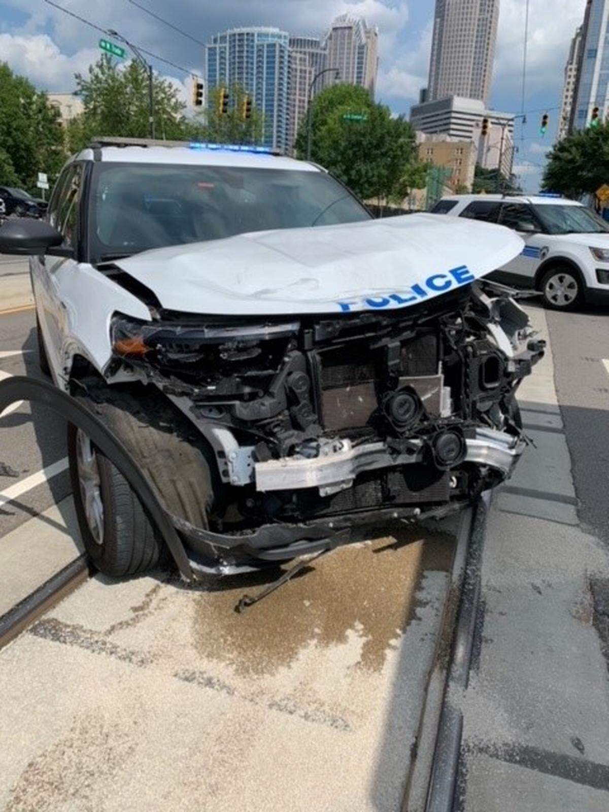 An unidentified Charlotte-Mecklenburg Police officer suffered minor injuries in what the department called an accident at the intersection of Trade and Graham streets in uptown on Thursday, July 7, 2022.