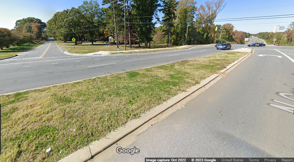 The car crashed during a police pursuit near the intersection of North Graham Street and Rumble Road. CMPD said.