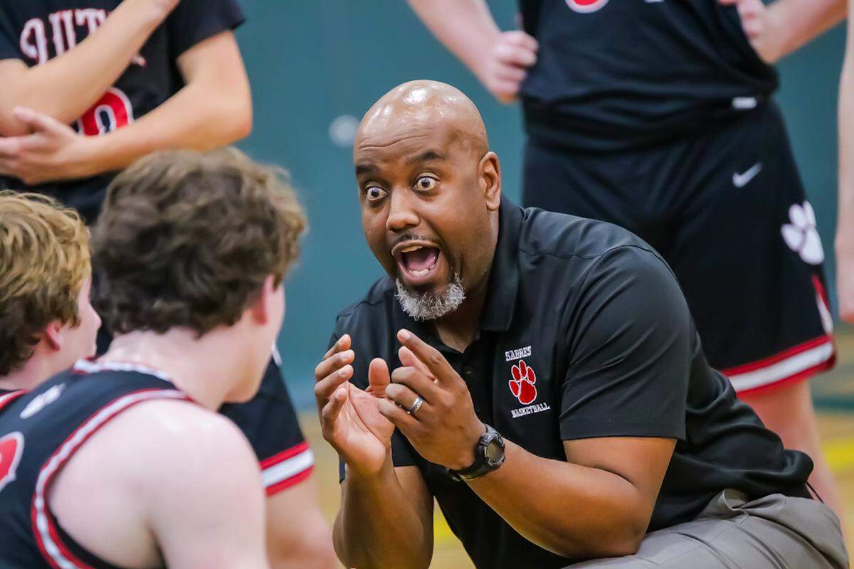 South Mecks Head Basketball Coach Christopher McDonald Gives Him Team Some Game Plays During Timeout At The Independence High’s holiday tournament