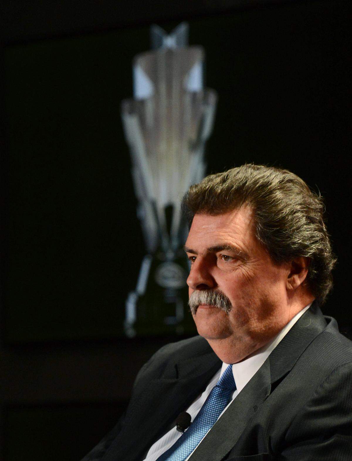 Mike Helton, president of NASCAR listens to questions following Brian France’s announcement of the new championship format that will put greater emphasis on winning races all season long, expands the current Chase for the NASCAR Sprint Cup field to 16 drivers, and implements a new round-by-round advancement format that will ultimately reward a champion during the NASCAR Sprint Cup Series Media Tour on Thursday, January 30, 2014 at the Charlotte Convention Center in Charlotte, NC. Brian France is the CEO and Chairman of NASCAR.