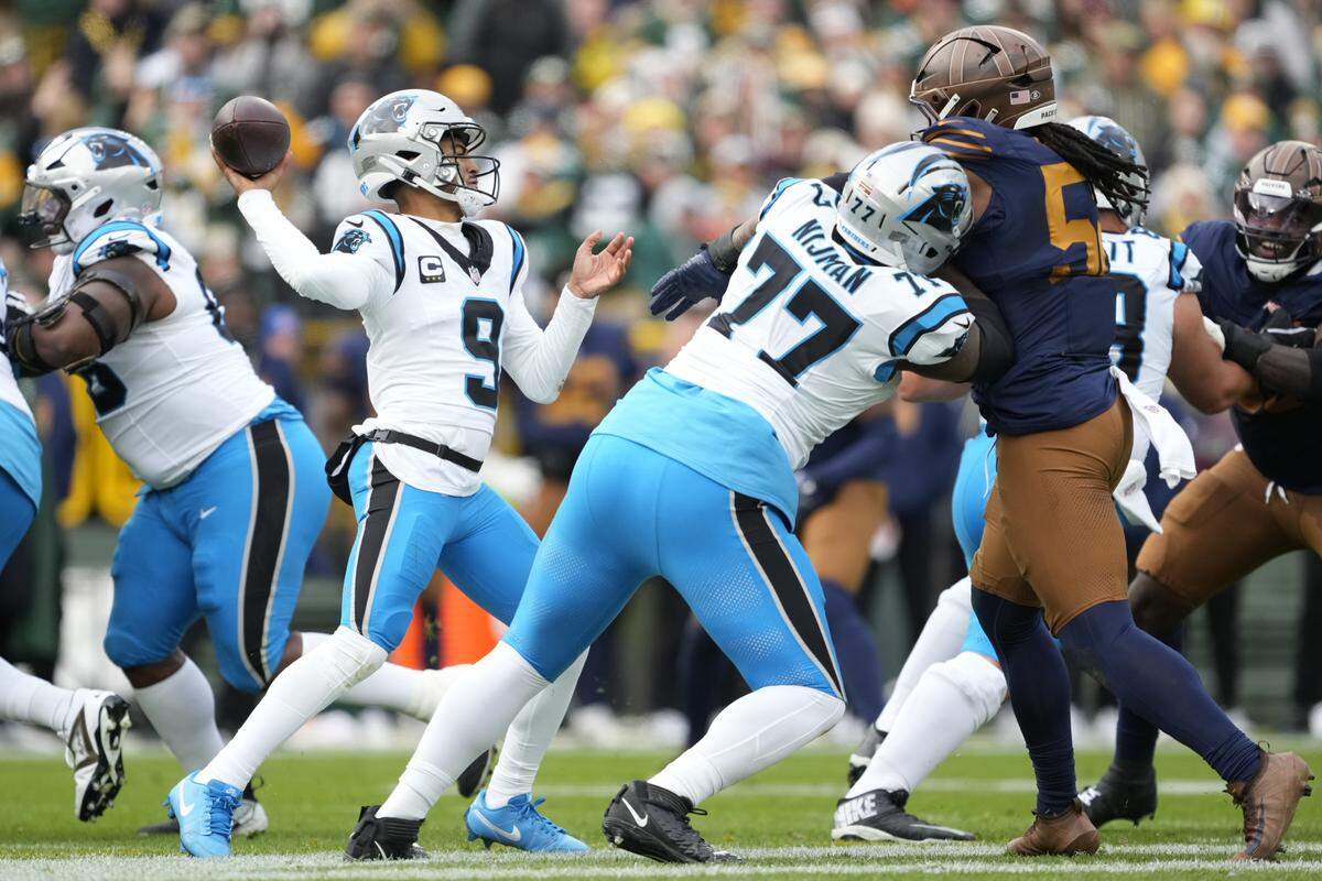 Carolina Panthers QB Bryce Young throws a pass in Sunday’s second quarter against the Green Bay Packers at Lambeau Field.