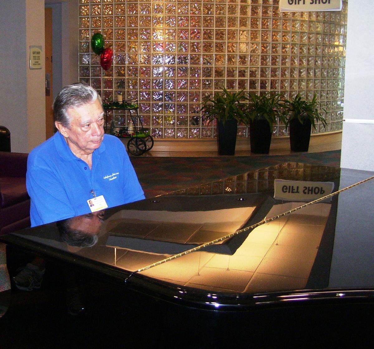 William “Bill” Branner, shown in this 2011 photo, played piano in the lobby at Presbyterian Hospital Matthews, now known as Novant Health Matthews, twice a week. Branner died on Saturday, Aug. 27, 2022, according to his son. He was 90. Branner volunteered his piano playing for 14 years, his son said.