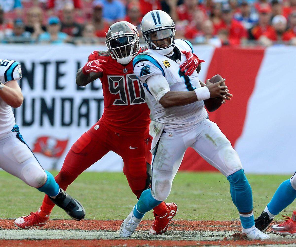 Carolina Panthers quarterback Cam Newton (1) is sacked by Tampa Bay Buccaneers defensive end Jason Pierre-Paul (90) during the second half Sunday. Newton was sacked three times and intercepted four in the Buccaneers’ 24-17 victory.