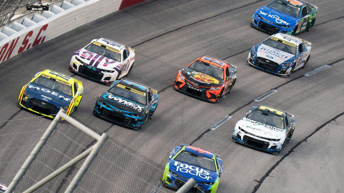 Erik Jones (43), Ross Chastain (1), Ryan Blaney (12), Alex Bowman (48), Martin Truex (19), Kevin Harvick (4) and Ricky Stenhouse Jr. (47) compete in the NASCAR Southern 500 auto race Sunday, Sept. 4, 2022, in Darlington, S.C. Jones won the race after taking the lead from Kyle Busch when Busch blew a motor with 30 laps remaining in the race.