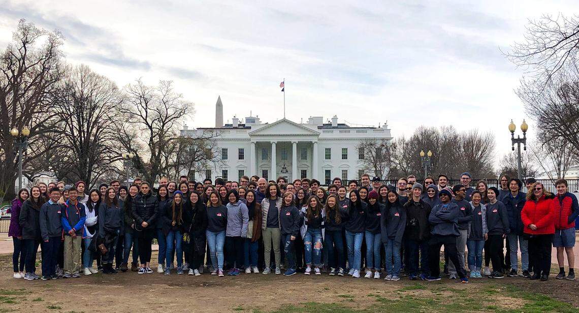 A group shot of the Youth Orchestras of Charlotte on their DC trip taken outside the White House.