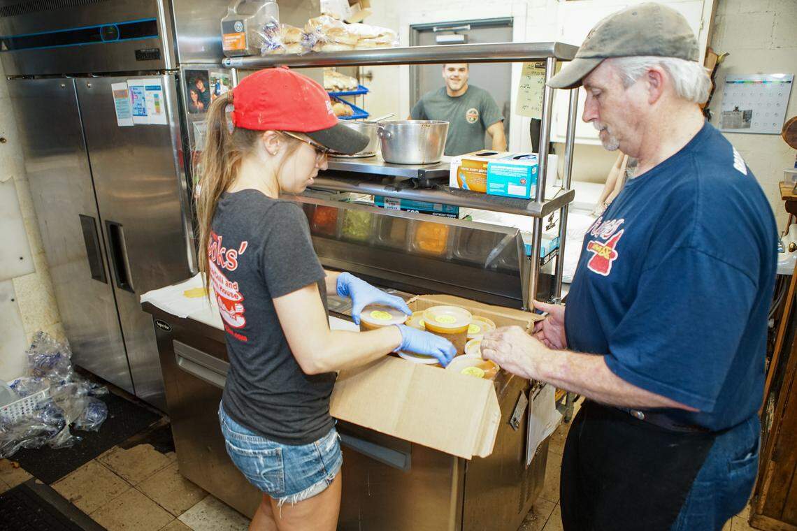 Scott Brooks works with his niece, Lauren Brooks, at Brooks’ Sandwich House, in August 2018. Scott Brooks was shot and killed on Monday morning as he attempted to open the restaurant for the day.