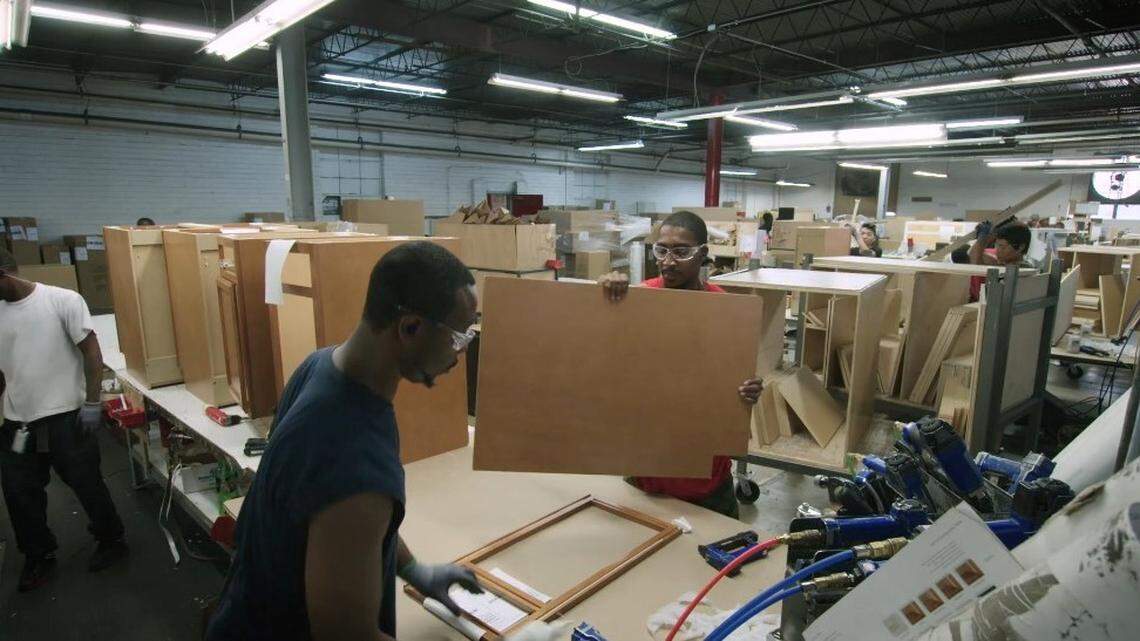 Workers at Marsh Furniture Company in High Point assemble cabinets. Cabinetry makers like Marsh say a trade policy change under consideration by the Biden administration would treat China more favorably than other countries and result in a loss of U.S. jobs at plants like this.