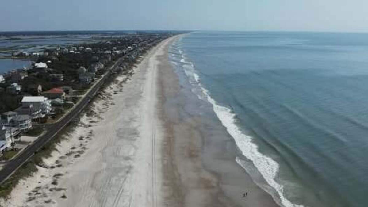 The “distressed swimmer” was reported around 3:30 p.m. Wednesday in Surf City, which is about a 130-mile drive southeast from Raleigh.