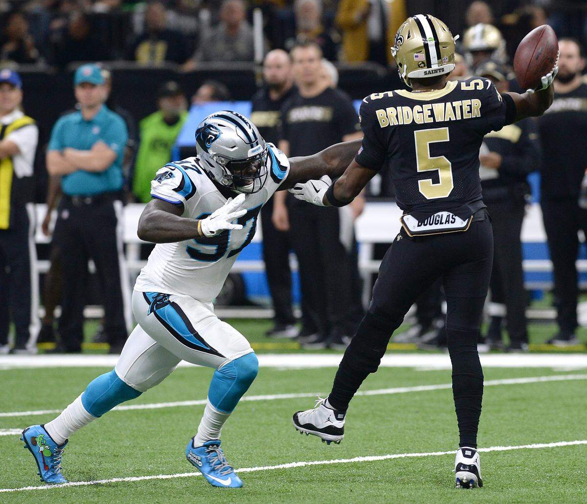 In 2018, Teddy Bridgewater (5) was pressured by Carolina Panthers defensive end Mario Addison. Bridgewater will be the Panthers’ starting QB in 2020.