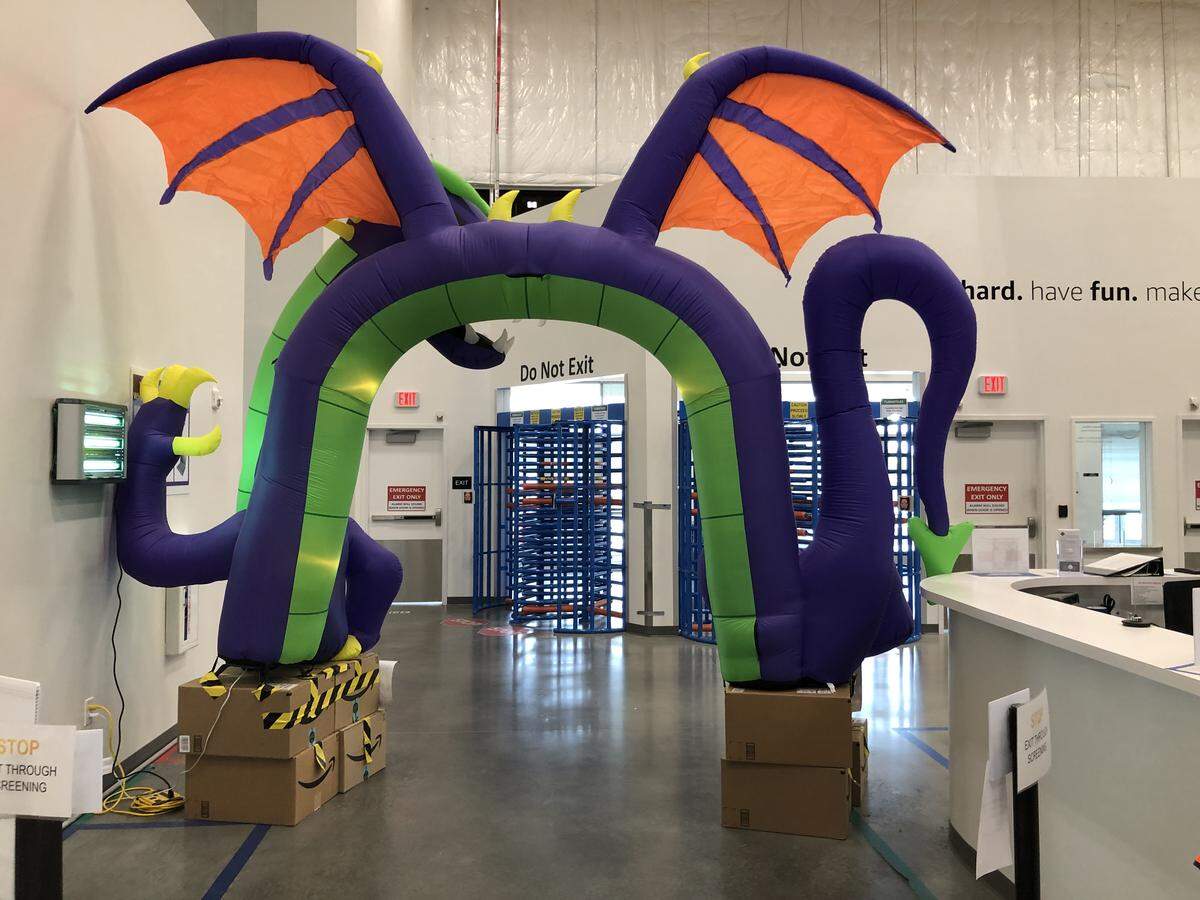 An inflatable dragon arch at the entrance of Amazon’s fulfillment center in Kannapolis represents the facility’s mascot. A spokesperson for Amazon said its previous mascot was the knights, until employees realized dragons were cooler.