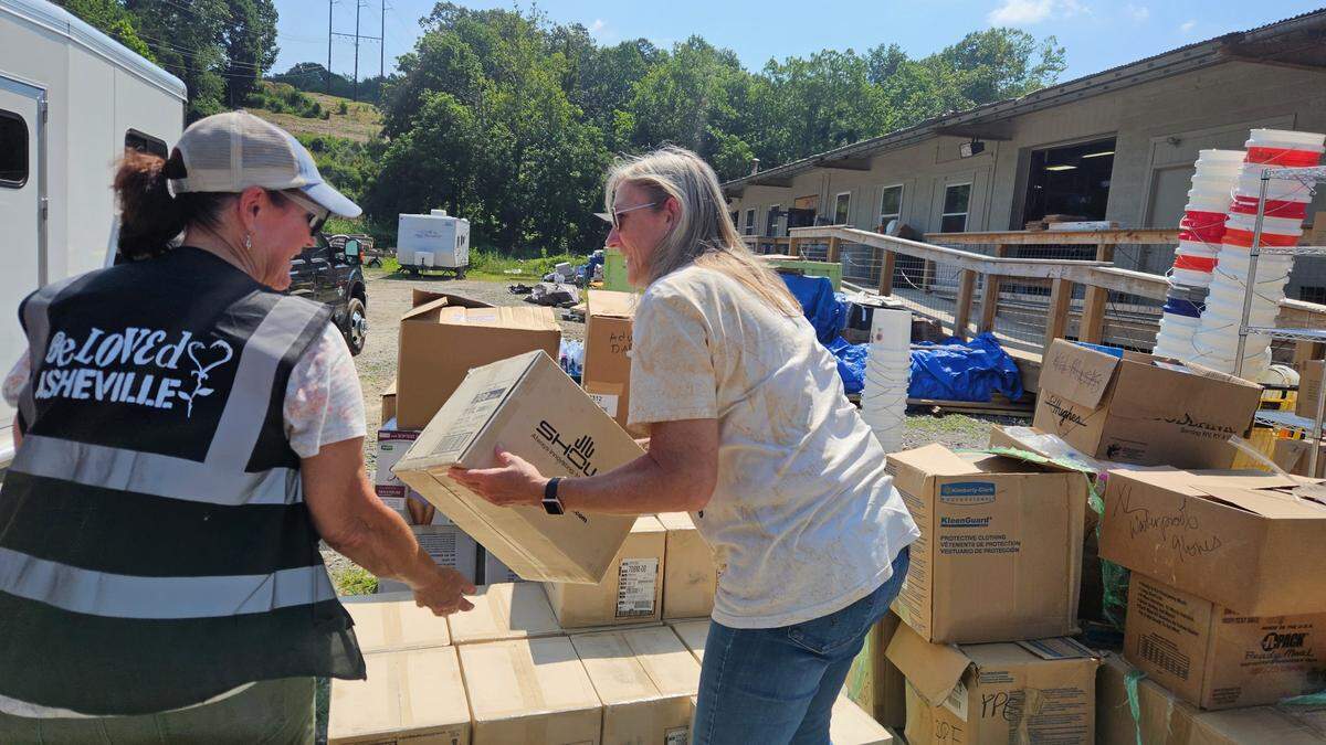 Volunteers with BeLoved Asheville pack supplies for flood relief efforts in Texas, part of the nonprofit’s disaster response work since Hurricane Helene struck Western North Carolina in September.
