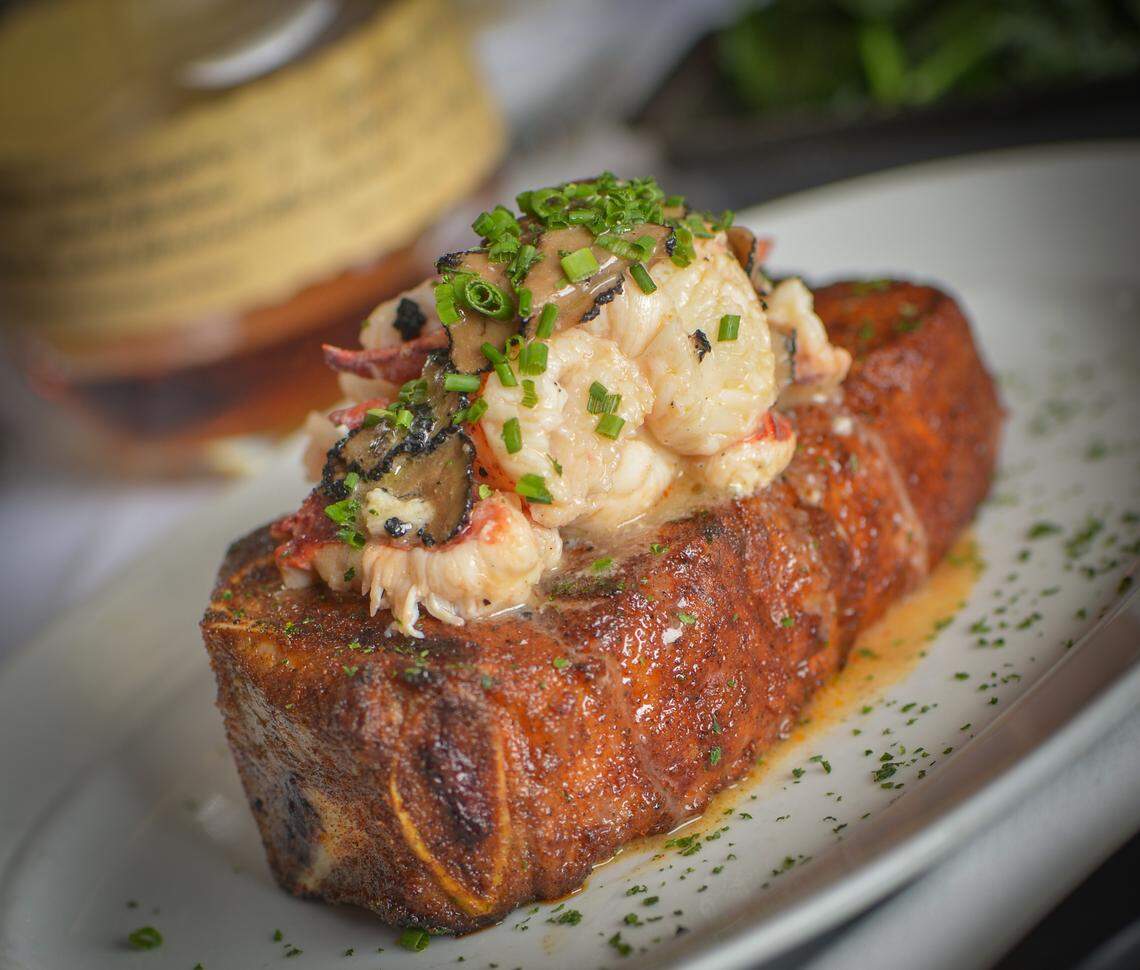 Steak 48 will offer its full menu, including this black-truffle-sauteed Maine Lobster topped steak, and open early for Easter.