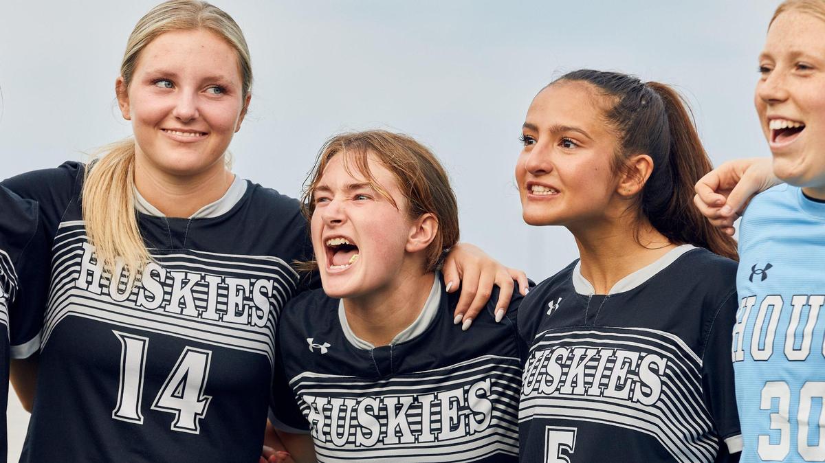 Hough Girl’s Soccer players hype up their teammates in the huddle on Senior Night against West Charlotte. The Hough Huskies won 10-0 after a mercy rule following halftime.