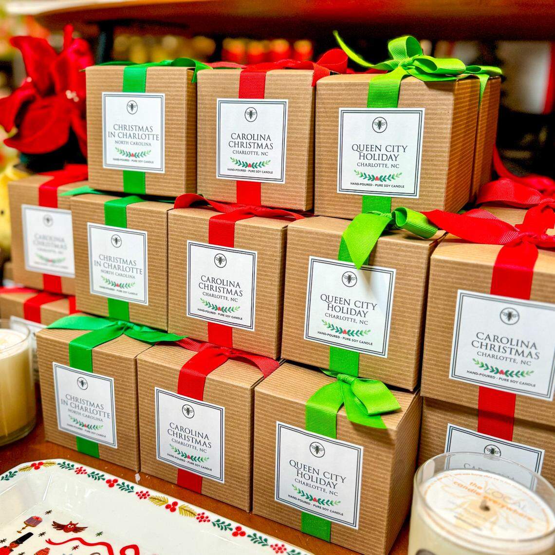 Candles and ornaments are among Paper Skyscraper gift shop items stocked for the holiday season. The store has two locations in Charlotte.