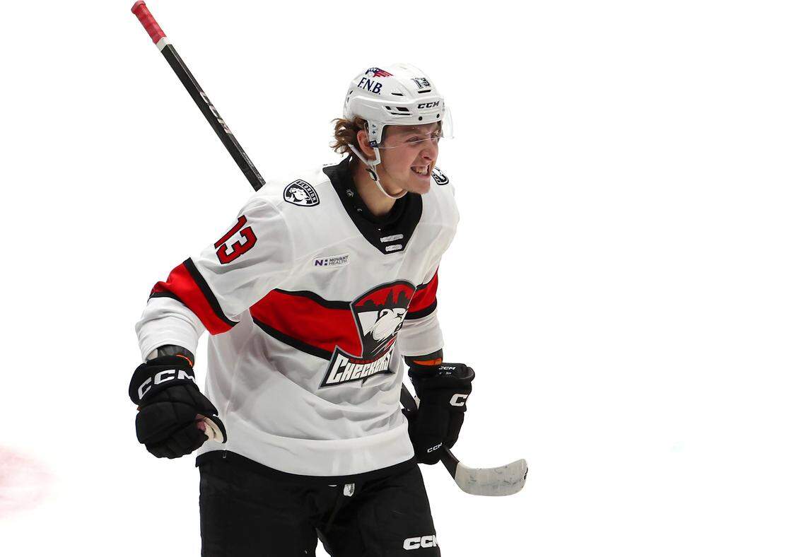 Charlotte Checkers Kai Schwindt celebrates his goal during first period action against the Iowa Wild on Friday, October 17, 2025 at Bojangles Coliseum in Charlotte, NC. 