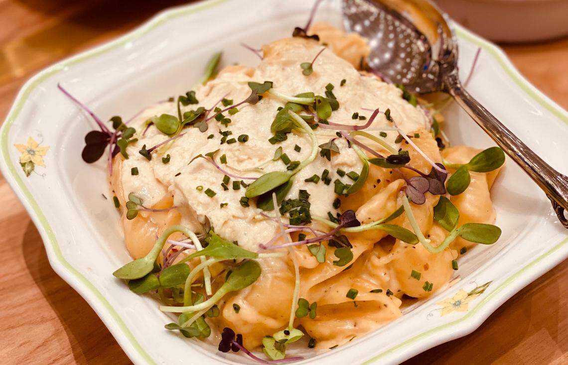 Supperland’s Miso Mac & Cheese showcases bite-sized pasta shells bathed in North Carolina miso mornay and topped with miso cream.