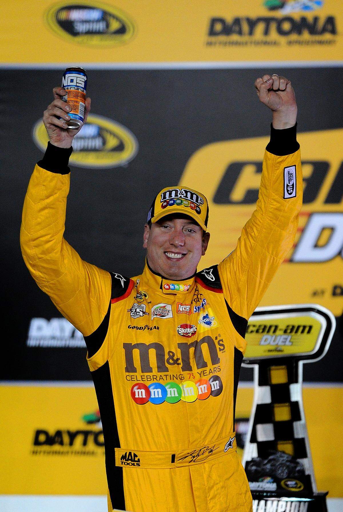 NASCAR Sprint Cup Series driver Kyle Busch celebrates his victory in the second can-am duel qualifying race at Daytona International Speedway on Thursday, February 18, 2016. Busch held off driver Jamie McMurray for the victory.