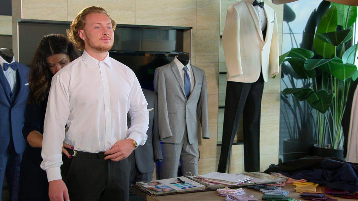 “Love is Blind” star Johnny picking out a tuxedo from The Tuxedo Shoppe.