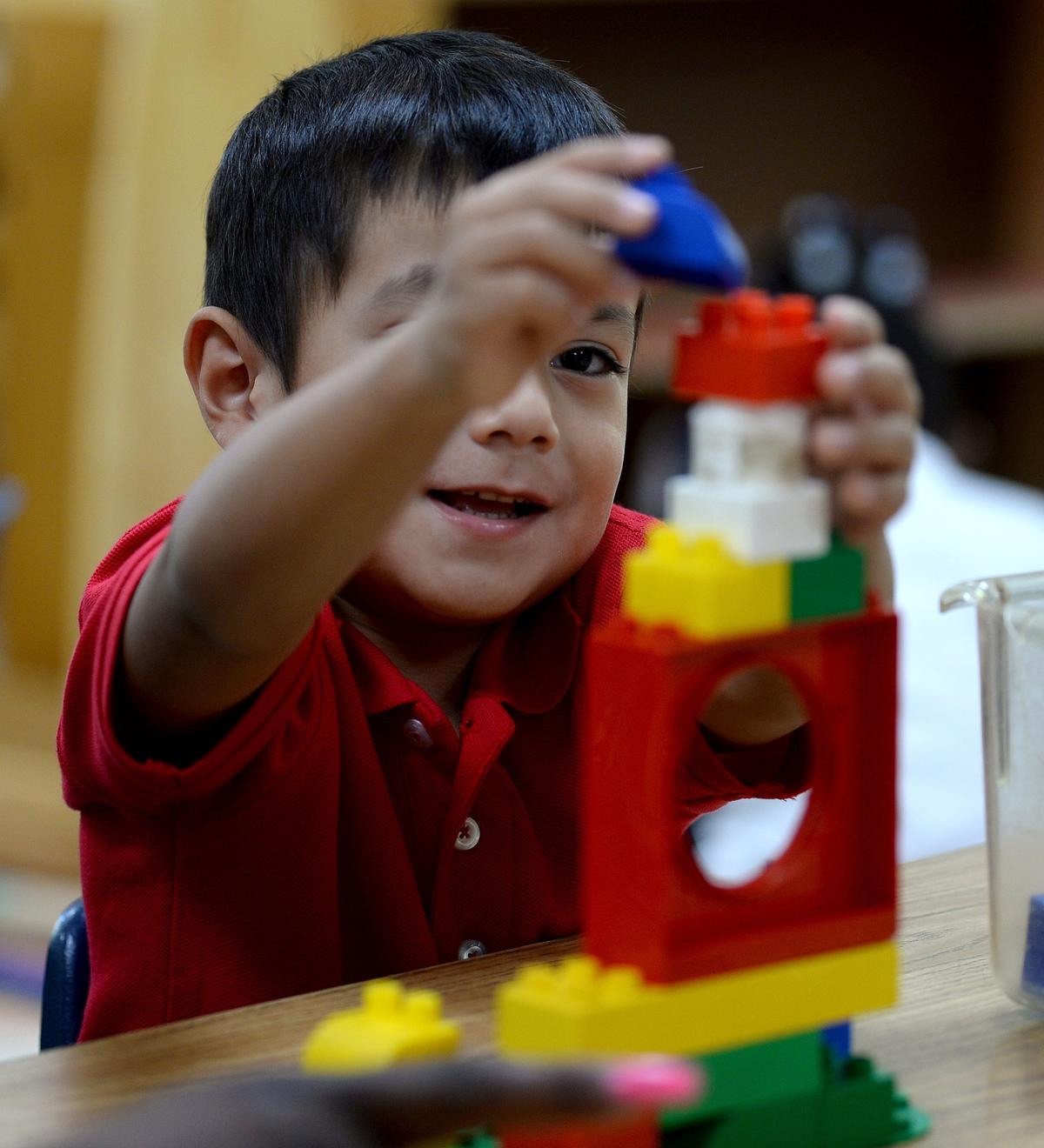Angelray Chong, playing with construction blocks at Smart Kids No. 1 in Charlotte, is part of the NC Pre-K program.