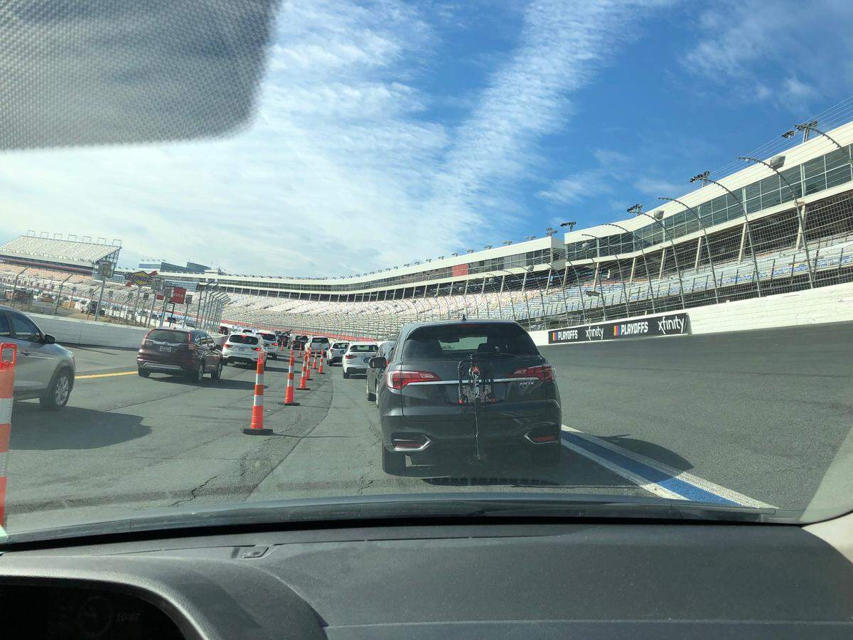 Hundreds of cars circle the track at Charlotte Motor Speedway on Friday as part of Atrium Health’s mass COVID-19 vaccination clinic. Photo courtesy of Jennifer Halls
