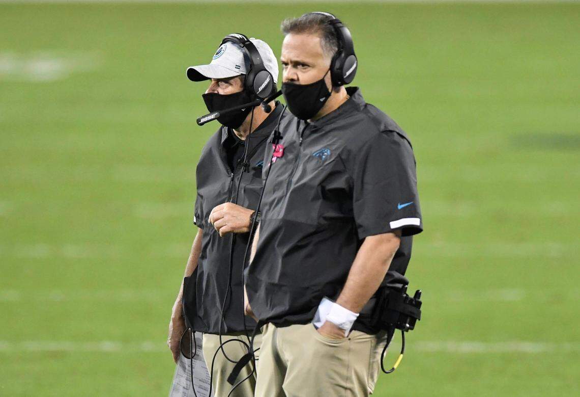 Carolina Panthers head coach Matt Rhule and defensive coordinator Phil Snow watches the team play against the Atlanta Falcons at Bank of America Stadium on Thursday, October 29, 2020. The Falcons won 25-17.