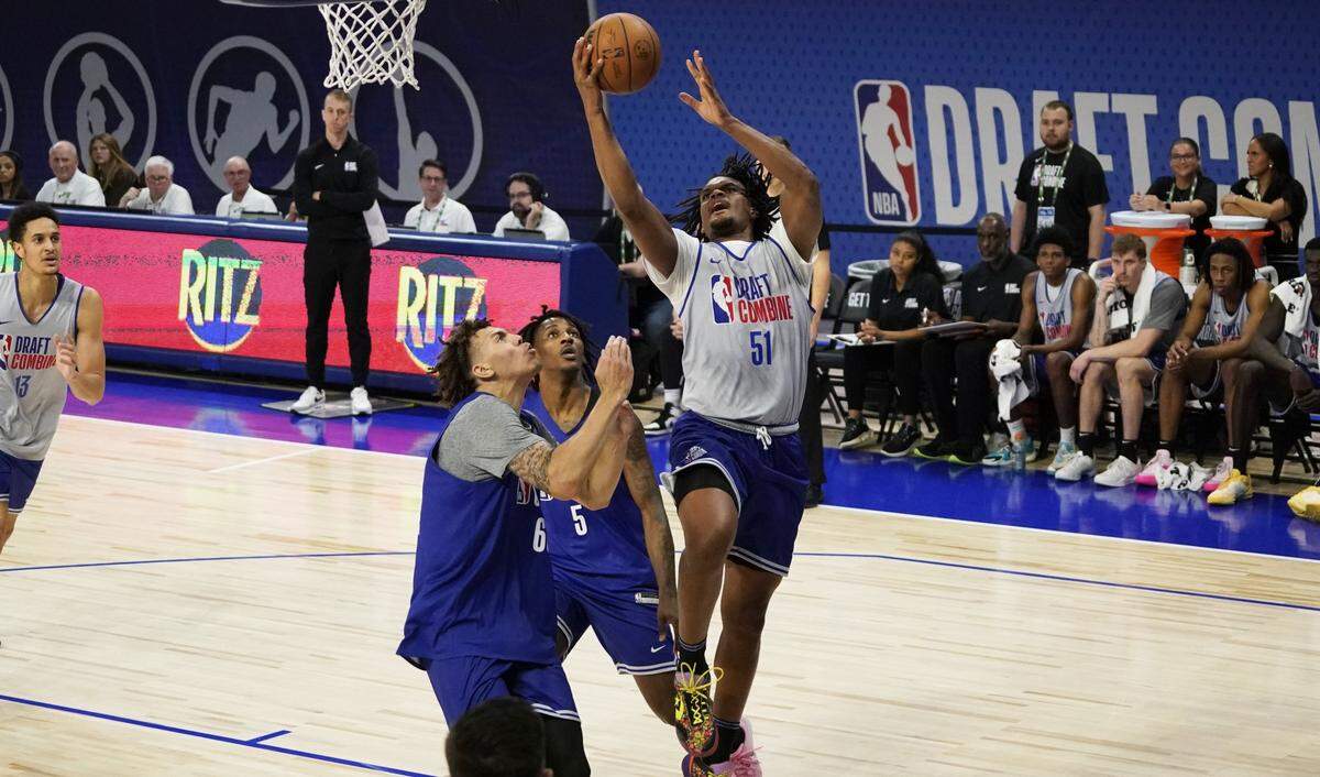 Dillon Jones (51) and Jamir Watkins (5) participate during the 2024 NBA Draft Combine  at Wintrust Arena. Mandatory Credit: