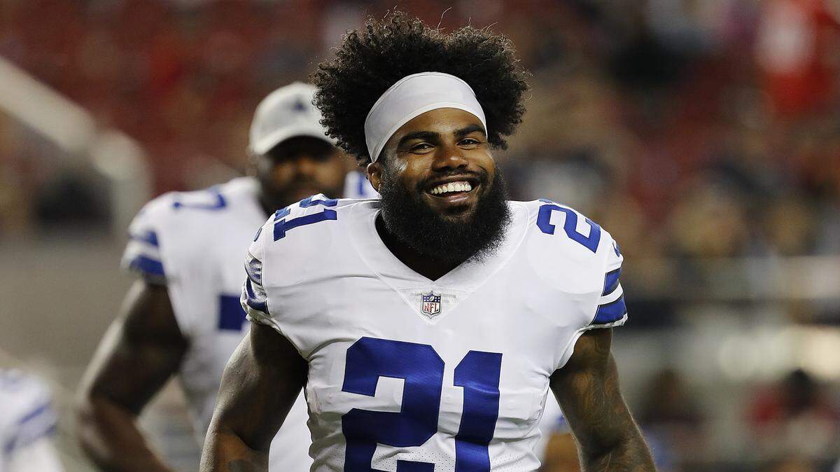 Dallas Cowboys running back Ezekiel Elliott (21)  is among the NFL’s best backs, but the Carolina Panthers have one of the league’s best defensive lines, too.
