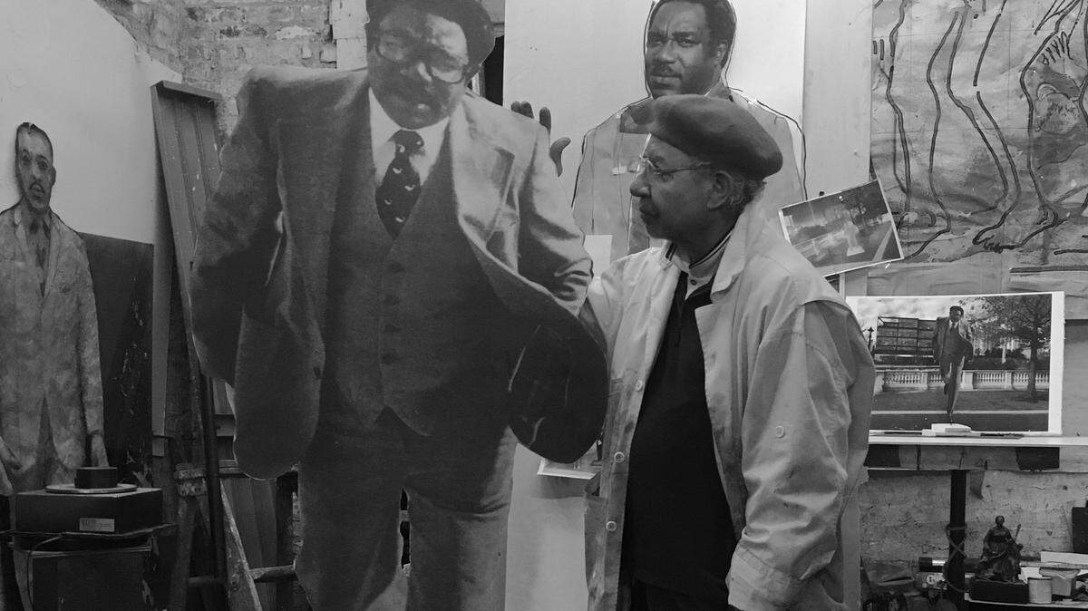 Sculptor Ed Hamilton in his studio, with an array of his ideas for the Chambers piece: “I’m thinking outside the box.”