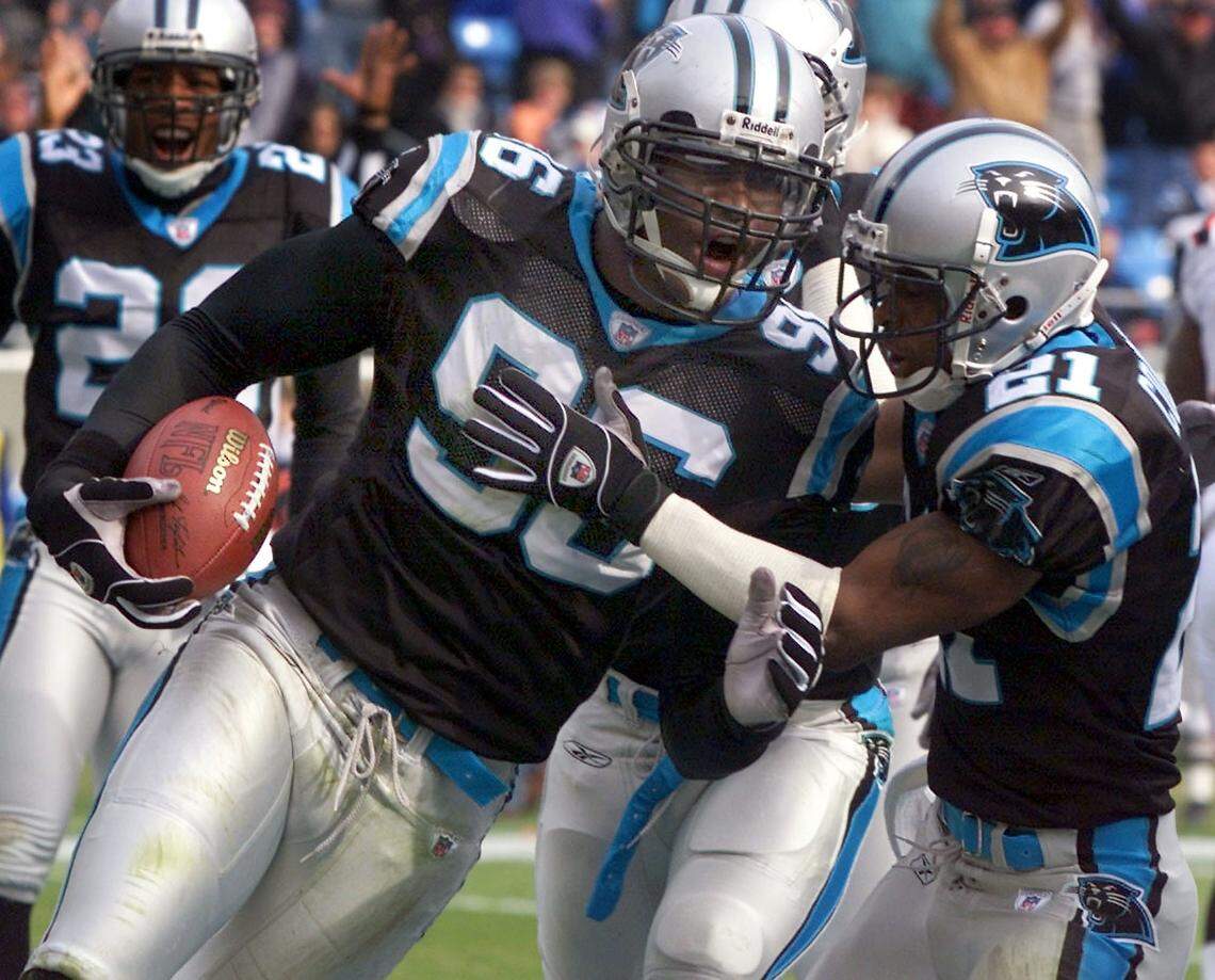 Former Carolina Panthers defensive end Al Wallace (96) celebrates after a touchdown. Wallace said that many players, including himself, didn’t get to choose exactly when to retire.
