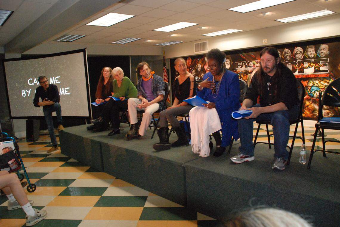Steve Umberger (left) leads a chat between the audience and StreetsmARTs participants Belinda Hunter, (from second to left) Mary Subach, Mark Sutton, Hilda Mojica, Christina C. Williams and Paul Lessard.
