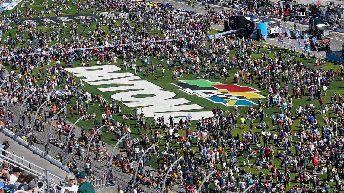 Fans fill the infield for pre-race entertainment before the NASCAR Daytona 500 auto race at Daytona International Speedway, Sunday, Feb. 20, 2022, in Daytona Beach, Fla. (AP Photo/David Graham)