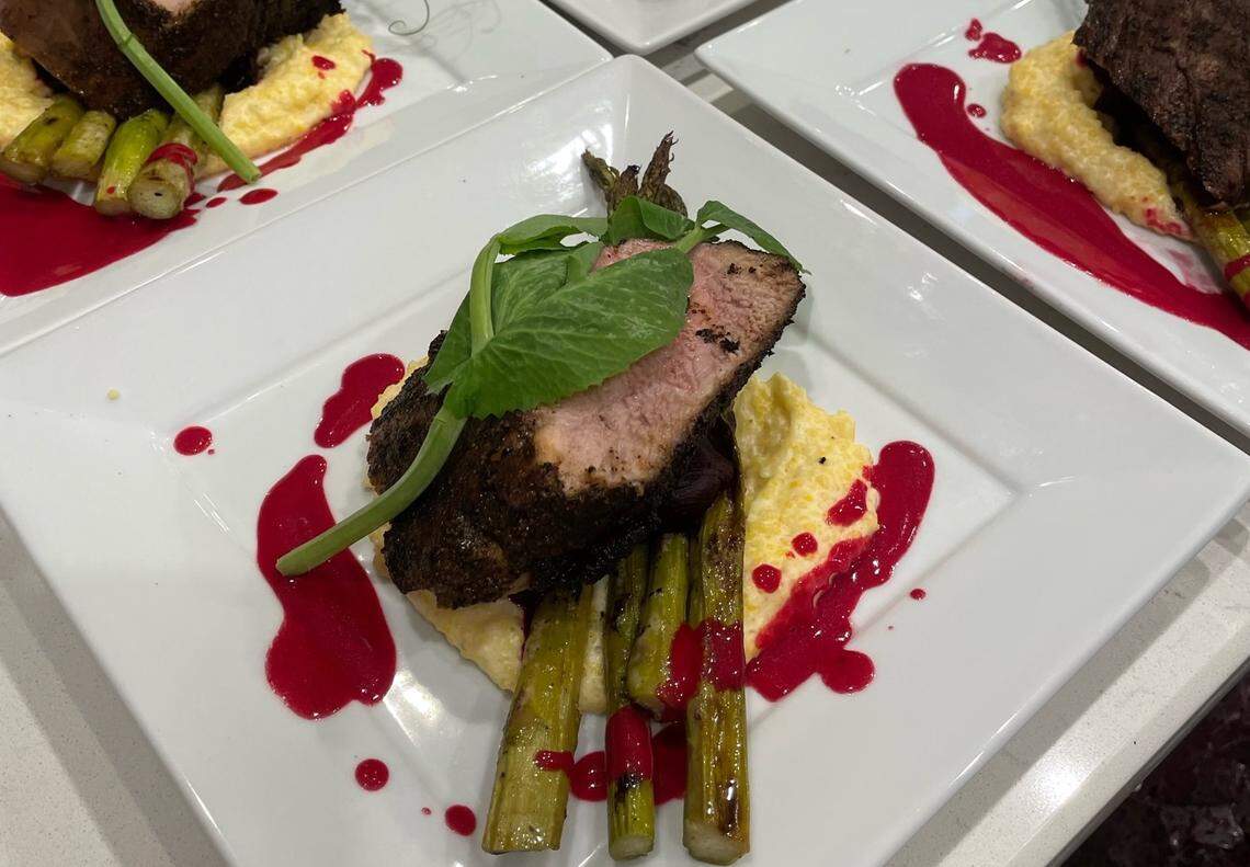 Coffee crusted pork tenderloin with beet beurre blanc.