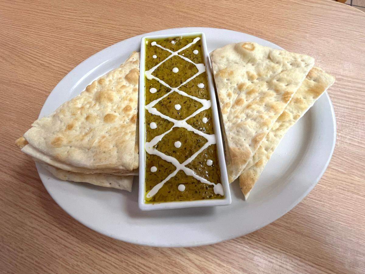 Kashke bademjan with freshly made pita at Athens Pizza & Kabobs.