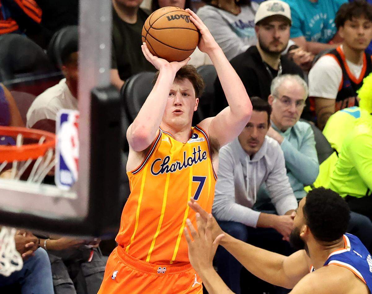 Charlotte Hornets forward Kon Knueppel releases a three-point shot during action against the New York Knicks at Spectrum Center in Charlotte, North Carolina, on March 26, 2026. 