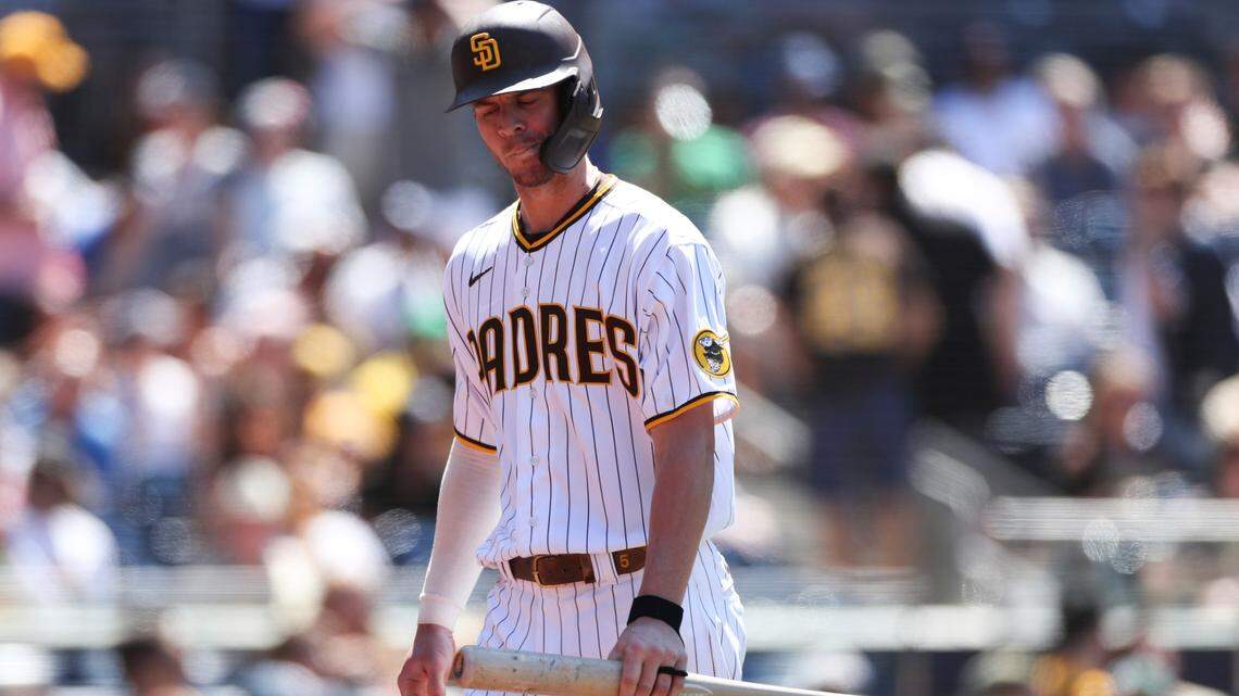 The Padres’ Wil Myers reacts after being called out on strikes during a baseball game against the Oakland Athletics, Wednesday, July 28, 2021, in San Diego. Myers, who lives in Charlotte during the offseason, is mired in a legal fight with a local country club over $64,000 in unpaid initiation fees. He says he was lied to about the availability of tee times.