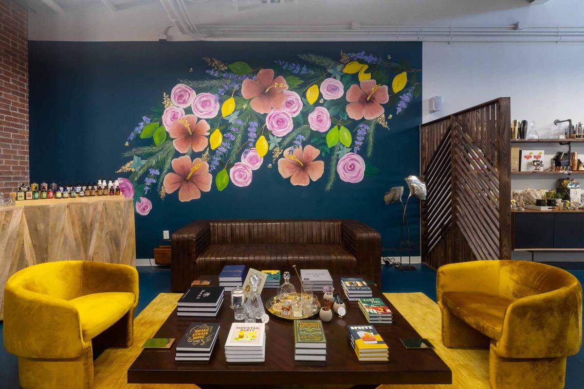 Amber King and Kelly Copely designed a mural at The Cocktailery. The new retailer also offers mixology classes, so you can learn how to use all your new supplies.