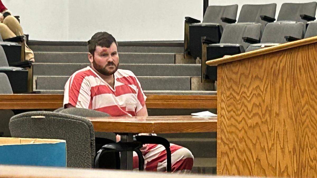 Zachary East Elias appears in court Thursday after being arrested for killing two people and injuring another during a shooting at a Rock Hill smoke shop.
