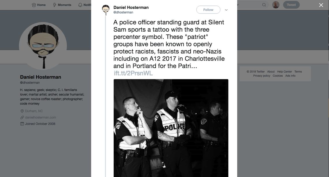 A Chapel Hill police officer has been ordered to cover up a tattoo of the Roman numeral three in a circle of stars on his forearm because of “negative interpretations of that tattoo.”