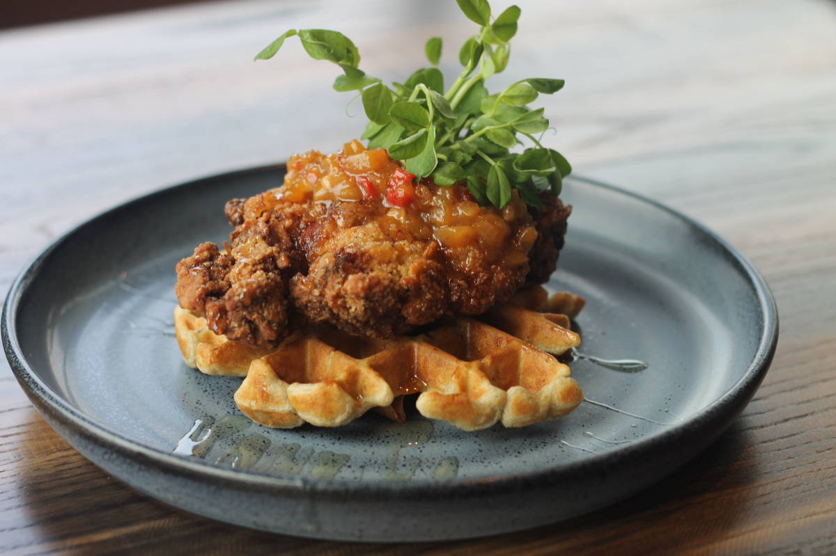 Hungry for brunch? The Golden Owl Tavern’s Buttermilk Fried Chicken & Waffles features chicken thighs, peach chili chutney and honey atop a buckwheat waffle ($16).