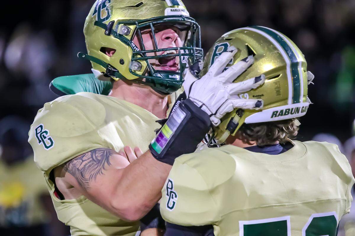 Rabun Gap players celebrate after beating Providence Day in the 2024 NCISAA state championship game. 